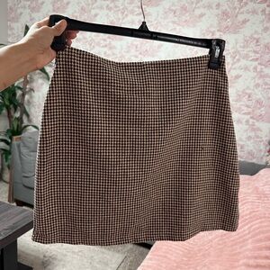 Plaid mini skirt. Brand new, don’t remember the brand or size. Fits like S/M